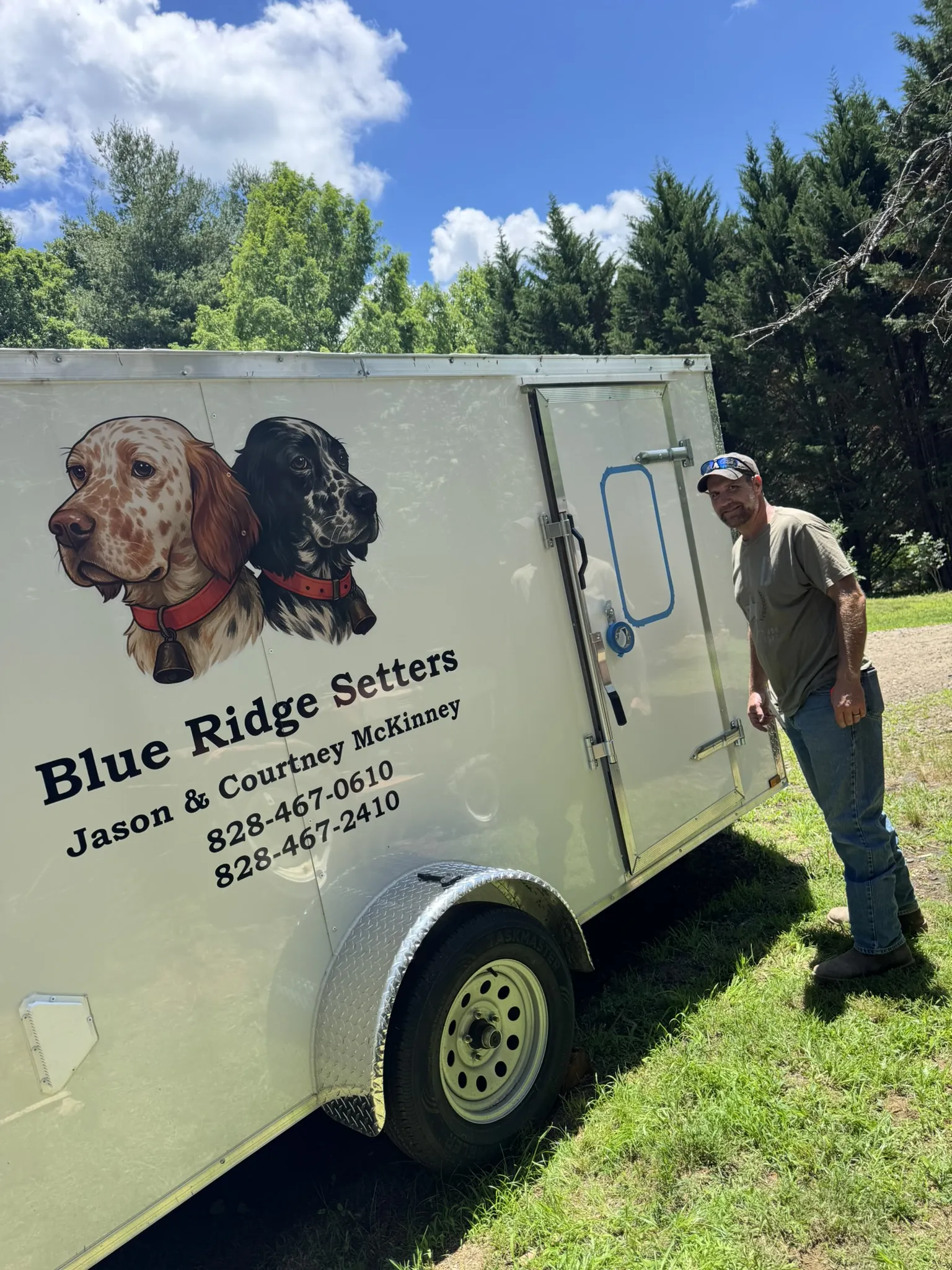 The Blue Ridge Setters dog trailer with Jason alongside it