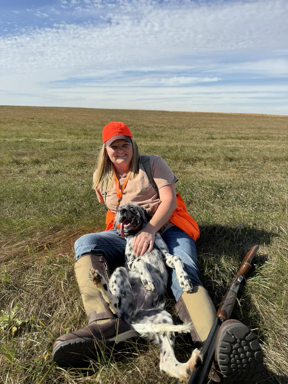 Bessie resting with Courtney on the prairie